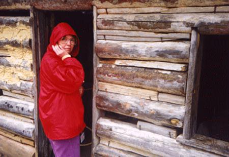 Lois entering slave quarters.